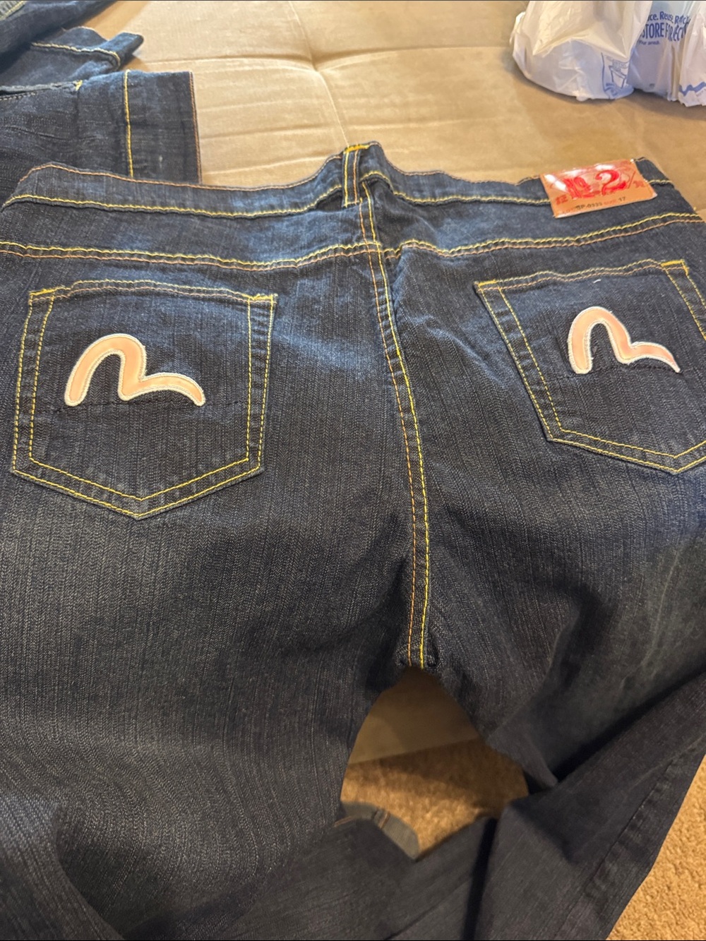 Evisu Dark Blue Jeans with Pink Back-Pocket Crest